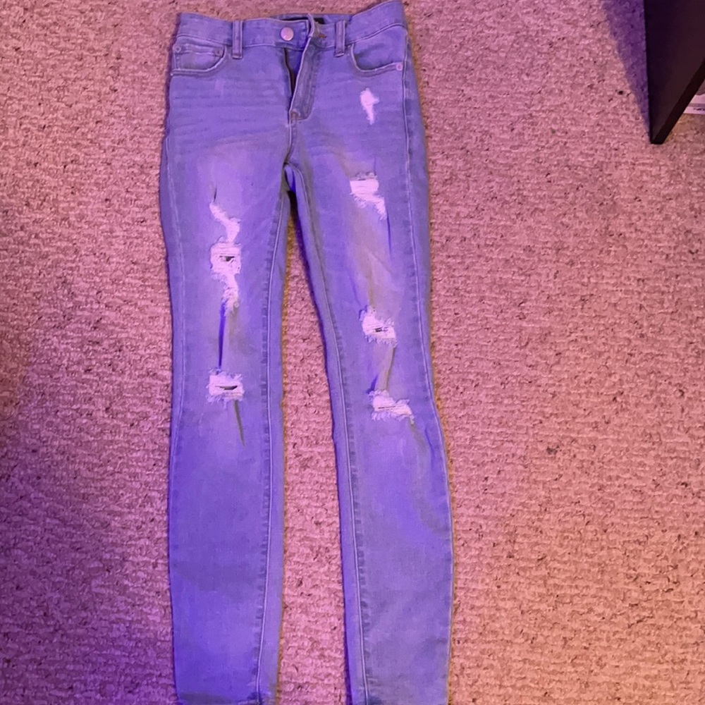 blue ripped jeans